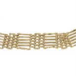 A 9ct gold gate-link bracelet, gathered at a 9ct gold heart-shape padlock clasp.