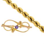 A 9ct gold bracelet and an early 20th century 9ct gold amethyst brooch.