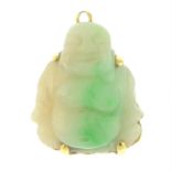 A carved jade Buddha pendant.