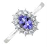 An 18ct gold tanzanite and diamond cluster ring.