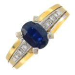 A sapphire single-stone ring, with diamond shoulders.