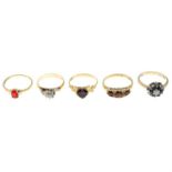 Five mostly 9ct gold gem-set rings.