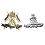 Two 9ct gold enamel regimental brooches.