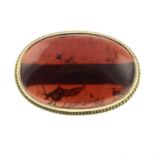 A mid 20th century garnet brooch.