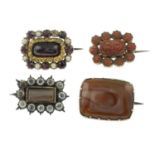 Four late 19th century to early 20th century gem-set brooches.