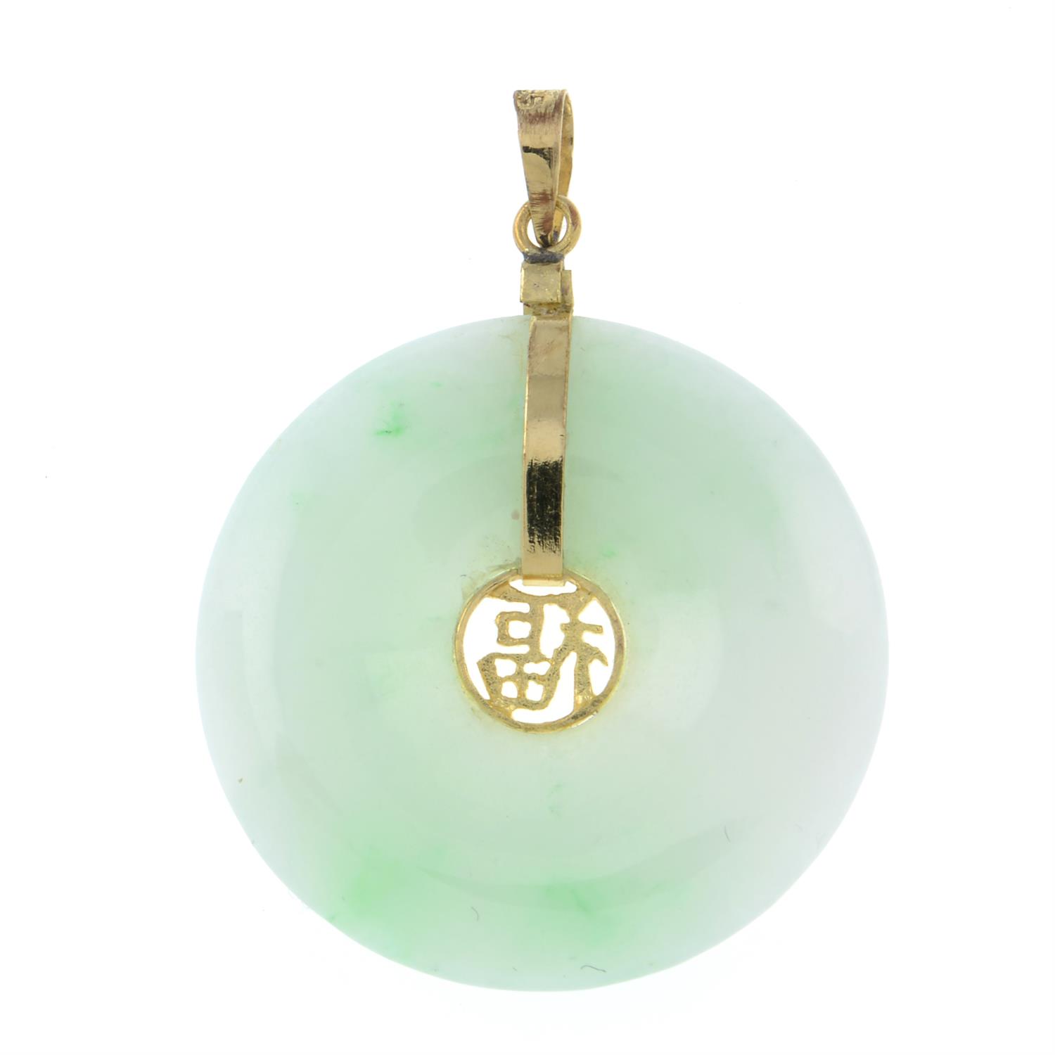 A jade bi pendant, with oriental character motif.