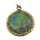 A mid Victorian gold abalone shell locket pendant.