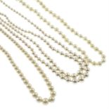 Fourteen imitation pearl necklaces.