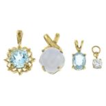 Four 9ct gold gem-set pendants.