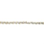 A 9ct gold illusion-set diamond bracelet.