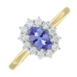 An 18ct gold tanzanite and diamond cluster ring.