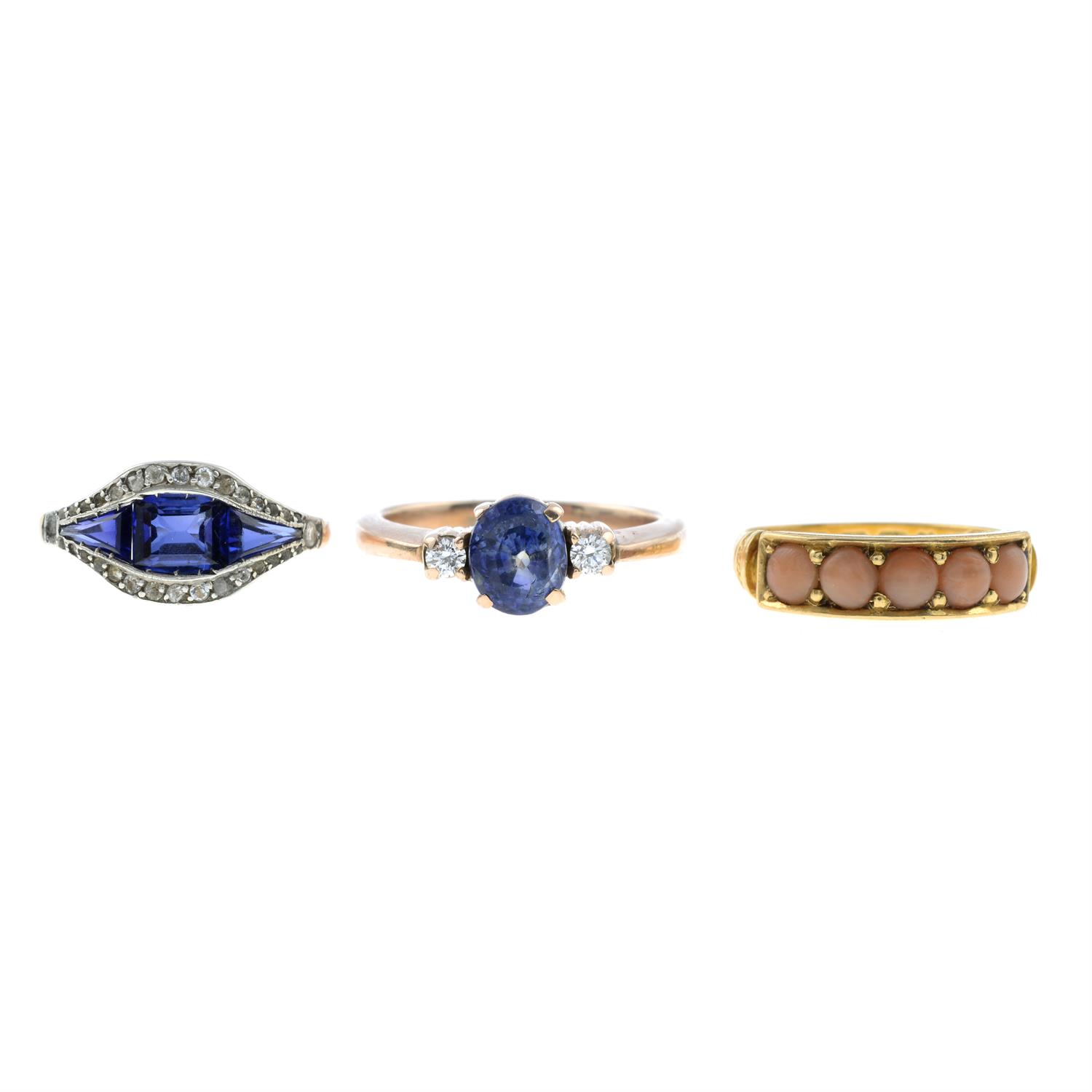 Three gem-set rings.