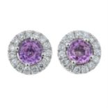 A pair of 18ct gold pink sapphire and diamond stud earrings.