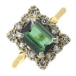 A green tourmaline and diamond cluster ring.