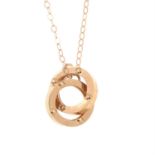 An 18ct gold interlocking hoop pendant, on an integral trace-link chain, together with an 18ct gold