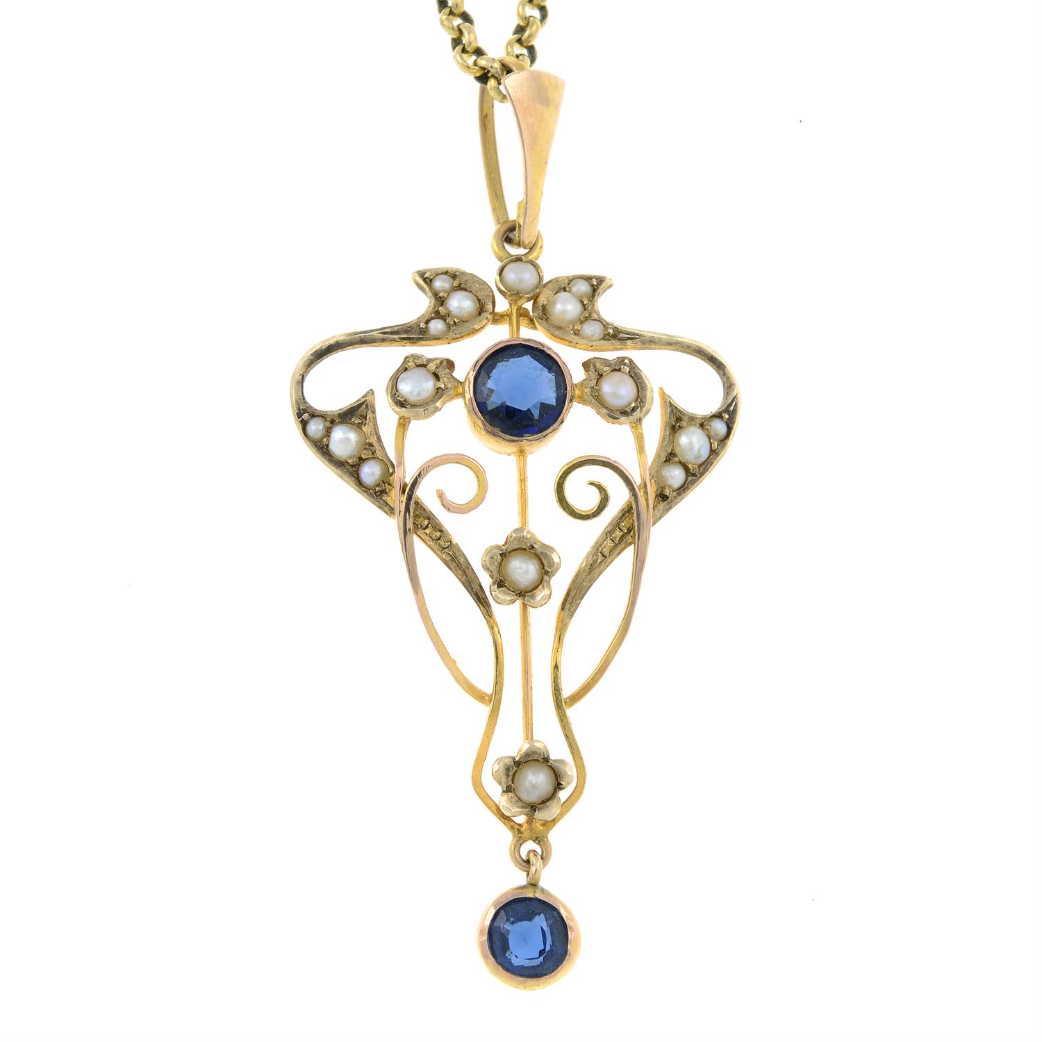 An early 20th century 9ct gold split pearl and blue paste openwork pendant, with later 9ct gold