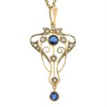 An early 20th century 9ct gold split pearl and blue paste openwork pendant, with later 9ct gold