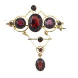 A garnet brooch.