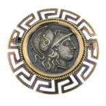 A coin brooch.