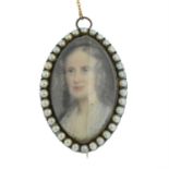 A 19th century split pearl and ivory portrait miniature brooch, painted to depict a lady. AF.