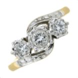 An 18ct gold brilliant-cut diamond three-stone ring.