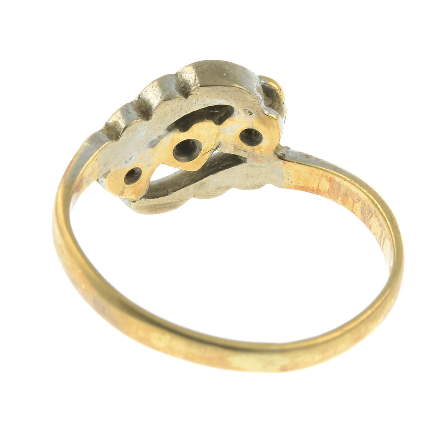 An 18ct gold single-cut diamond heart crossover ring. - Image 2 of 2