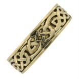 An openwork band ring, with Celtic knot motif.