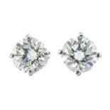 A pair of 18ct gold brilliant-cut diamond stud earrings.