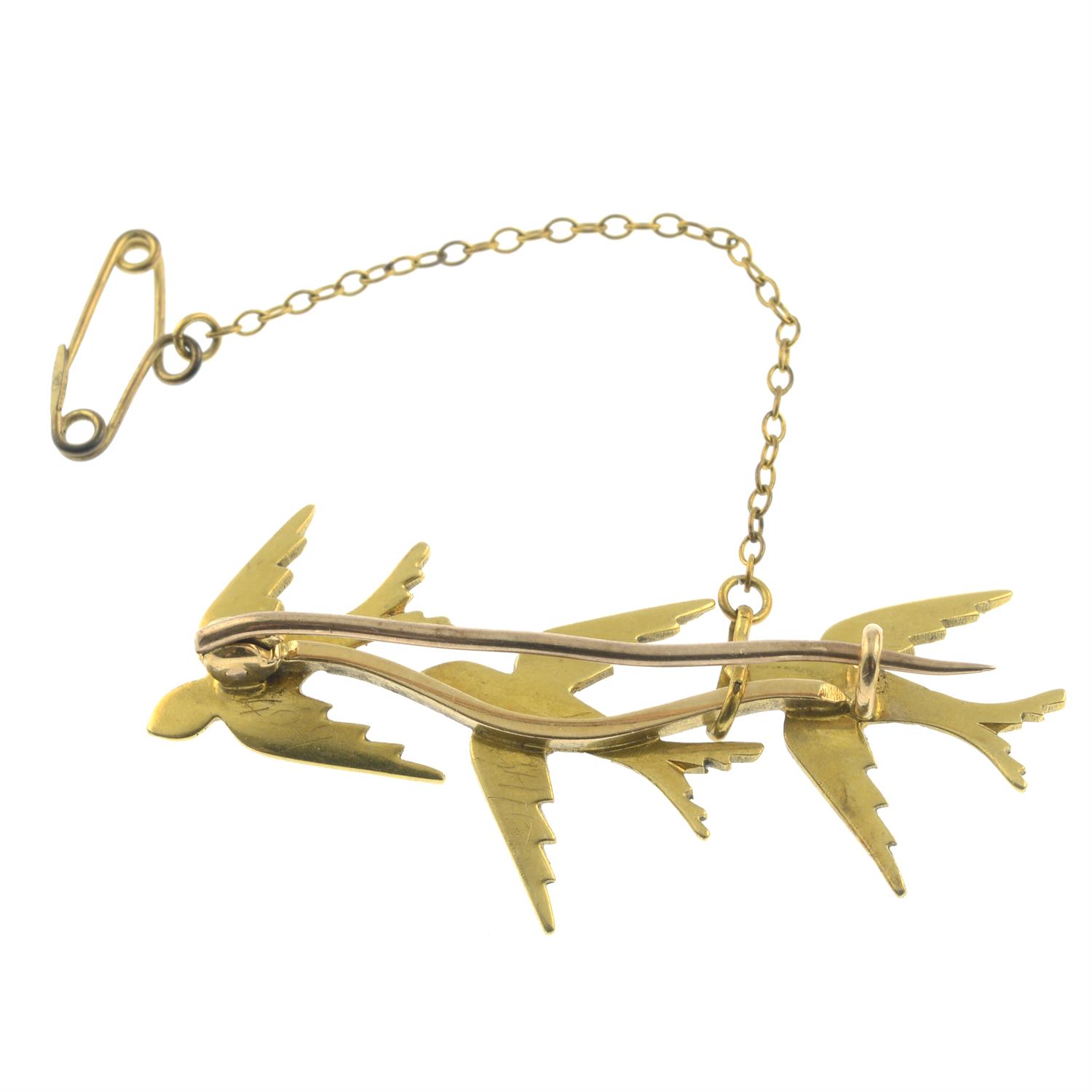 An early 20th century gold split pearl bar brooch, designed to depict three swallows in flight. - Image 2 of 2