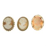 Four items of shell and conch shell cameo jewellery, to include three brooches and a pair of 9ct