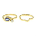 A set of two 18ct gold sapphire and diamond rings.