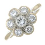 An 18ct gold brilliant-cut diamond floral cluster ring.