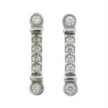 A pair of platinum 'Fleur de Lis' 'Key Bar' earrings, by Tiffany & Co.