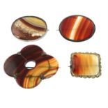 Four banded agate brooches.