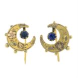 A pair of early 20th century 9ct gold bi-colour crescent earrings, each with blue paste accent.