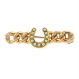 An early 20th century gold split pearl horseshoe bar brooch.