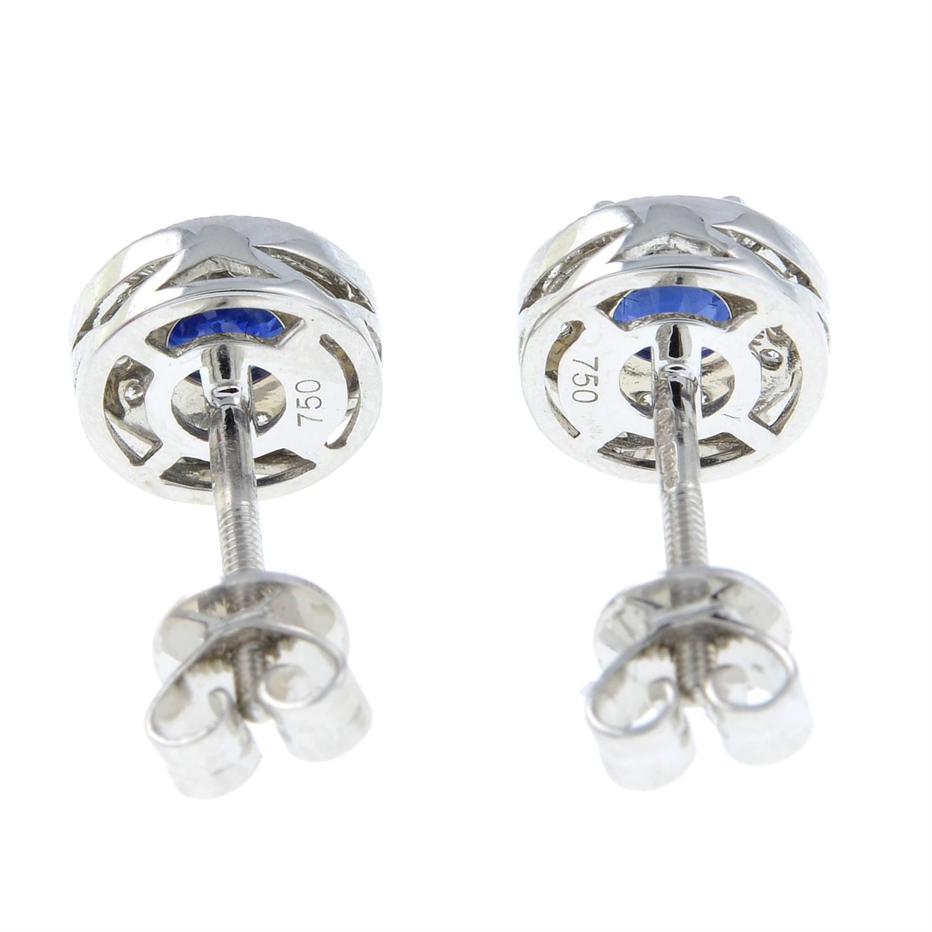 A pair of 18ct gold sapphire and diamond stud earrings. - Image 2 of 2