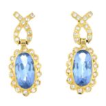 A pair of blue paste and cubic zirconia earrings.