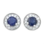 A pair of 18ct gold sapphire and diamond stud earrings.