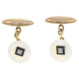 A pair of late 19th century gold mother-of-pearl, diamond and blue gem cufflinks.