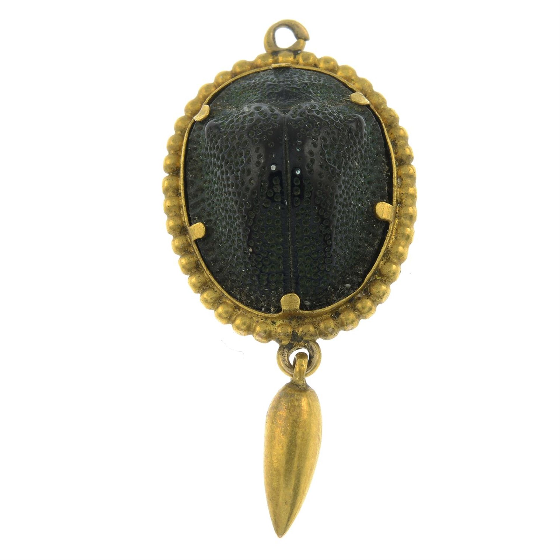 A late 19th century gold scarab beetle drop pendant.