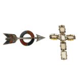 A Scottish hardstone arrow brooch and a smoky quartz cross pendant.