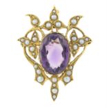 An early 20th century 15ct gold amethyst and split pearl brooch.