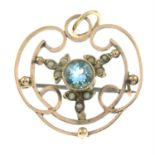 An early 20th century gold blue paste and split pearl brooch.