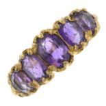 A 9ct gold amethyst five-stone ring.