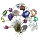 A multi-gem floral spray brooch.