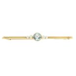An early 20th century 15ct gold aquamarine and seed pearl bar brooch.