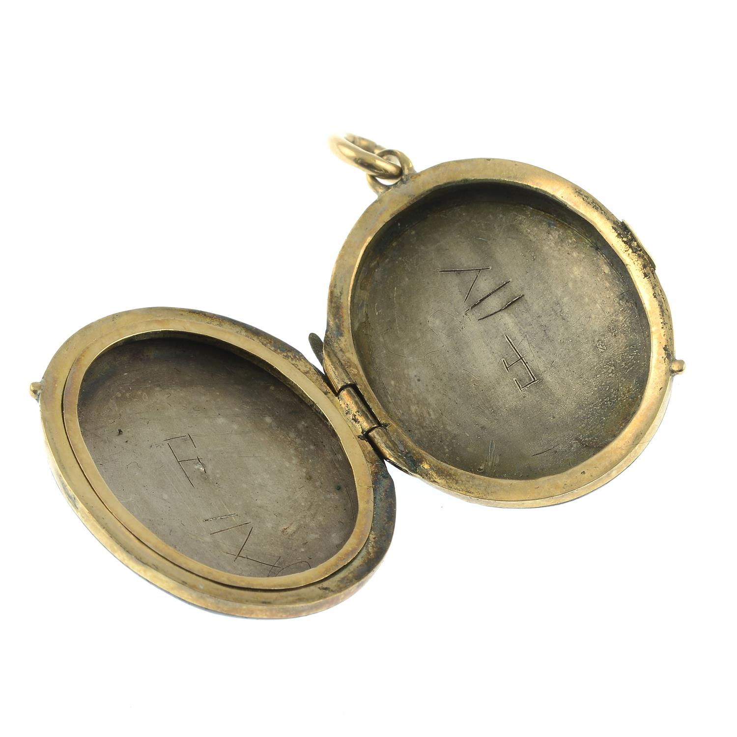 An early 20th century black enamel locket, with split pearl accent. - Image 3 of 3