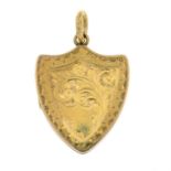 An Edwardian 15ct gold locket.