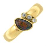 An opal and diamond dress ring.